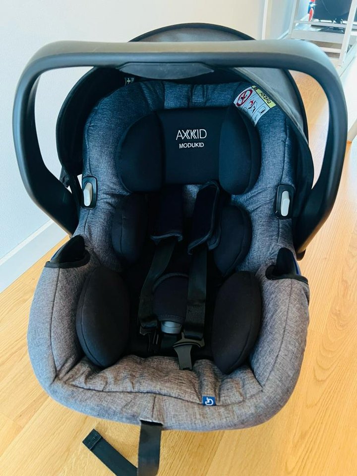 Axkid Modukid Infant Babyskydd