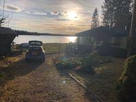 Modern stuga vid sjön Malmjärn