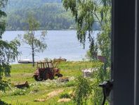 Hus I Höga Kusten intill badsjö