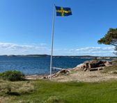 Hus med havsutsikt direkt vid stranden