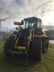 New Holland W 110