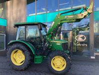 John Deere 5075 E  mycket redskap