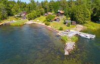 Sjötomt med  egen strand vid hus