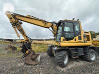 Komatsu PW 148-10 Med vagn