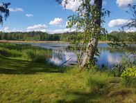 Litet hus med sjötomt 