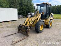 Hjullastare CAT 906 med redskap