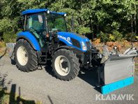 Traktor New Holland TD5.65 med Vikplog