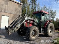 Traktor Case IH Cx 90 med timmervagn