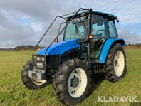 Skogsutrustad traktor New Holland TL70