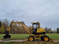 Komatsu PW95 ROTOTILT -Stödben+blad -Finans -Transport -Byte