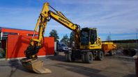 Komatsu Komatsu PW 148-10 GPS & Mörevagn