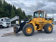 Hjullastare CAT 936 med skopa & gafflar