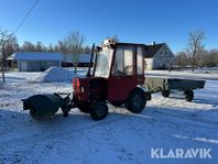 Kompakttraktor HAKO M-81 med kärra och sopval