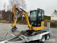 Grävmaskin CAT 301,8 med Williams trailer och