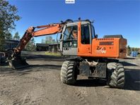 Hjulgrävare - Hitachi ZX130W - med tiltrotator, vagn och red