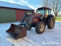 Traktor Valtra A75 med frontlastare och redsk