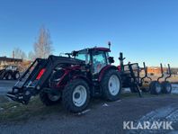 Traktor Valtra A105MH med timmervagn