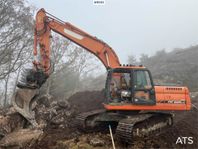 Doosan DX225LC med tiltrotator (SE VIDEO)