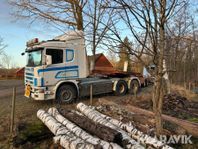 Lastbilsekipage Scania 164G 6*4 med skogsmask