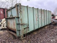 Lastväxlarcontainer för komprimator