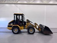 Cat 906 med planerskopa o snökrage