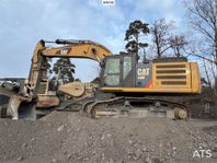 Bandgrävare Cat 340 F (VIDEO)