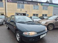 Mitsubishi Colt 1.3 Besiktigad skattat fri  låg mil