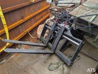 Hydrauliska Pallgafflar till grävmaskin