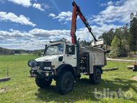 Terränglastbil UNIMOG U 2150 L 4X4 med kran / personkorg