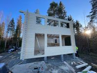byggnader i byggsats med vårt unika lamell timmer