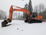 Grävmaskin Fiat Hitachi EX255 med tiltrotator och planerskop