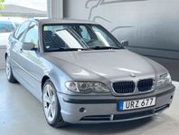 BMW 330 i 231hk | Navi | Drag | AC | Lågmil | Nybesiktad