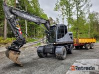 Grävmaskin Volvo EWR150E med tiltrotator, kärra och redskap