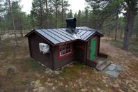 Fin stuga i fantastiskt läge invid Muonioälven i Saivomuotka
