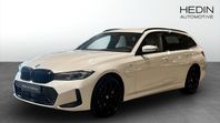 BMW 330e xDrive Touring M-sport Pro Business Launch Edt Head