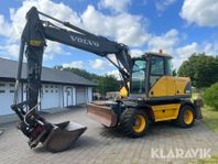 Grävmaskin Volvo EW140 med tiltrotator