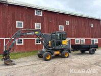 Grävmaskin Volvo EW60E med kärra och redskap