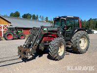 Traktor Valtra Valmet 6550 TwinTrac med lasta