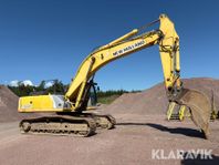 Grävmaskin New Holland E385 med skopa