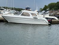 TG 7200 + Mercury 135 hk