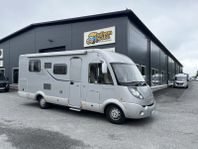Hymer B698CL helintegrerad, årsmodell 2009 med Queensbed