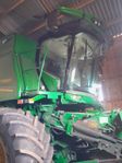 John Deere T560 SKÖRDETRÖSKA