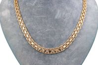 Halsband x-länk i 18k guld med stavar - doserad
