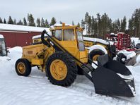 Volvo BM 218 med skopa och snökedjor