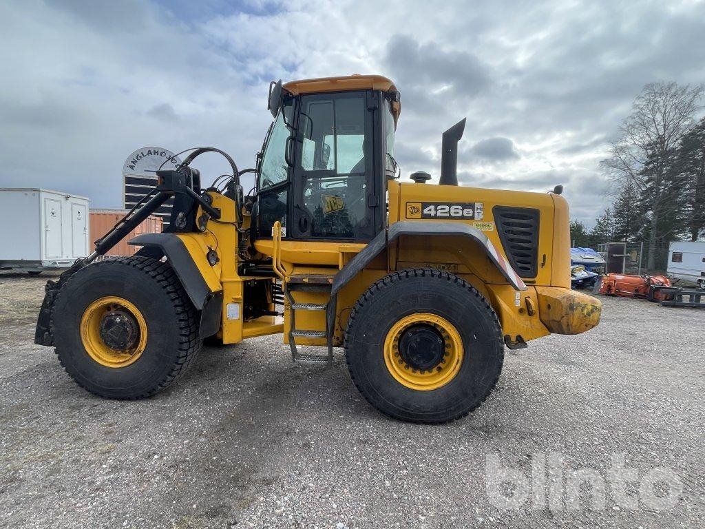 Hjullastare med utrustning JC...