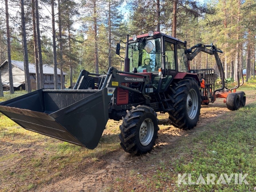Traktor med skogsvagn Belarus...