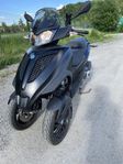 Piaggio MP300 IE.