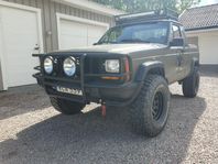 Jeep XJ A-traktor 33" mudders