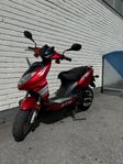Baotian Motor sports klass 1 moped 