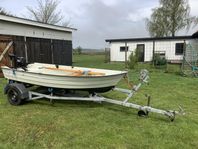 Båt med 30-km trailer 